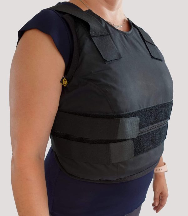 Physical aggression protective vest with padded torso protection, side view — for special-needs care environments