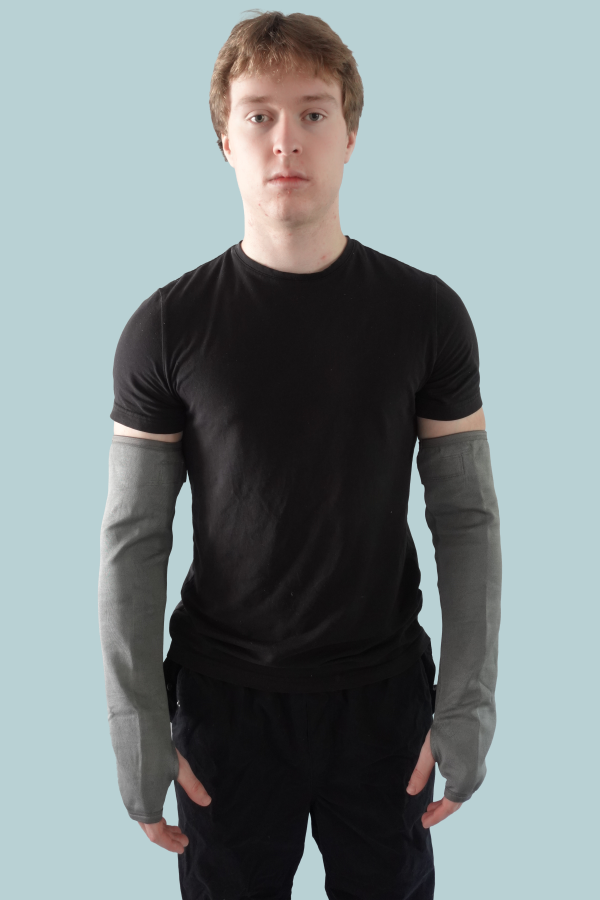 Extra long bite resistant arm guards with thumbhole worn on both forearms